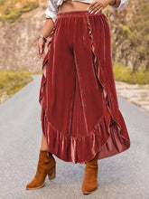Plus size velvet ruffle wide leg pants in rich burgundy with layered ruffle hem along side and bottom