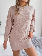 Diamond cable knit blush pink sweater dress with long sleeves and ribbed cuffs
