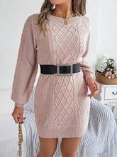 Diamond cable knit blush pink sweater dress with long sleeves and black belt