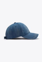 Distressed adjustable baseball cap in denim blue with strap
