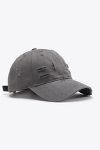 Distressed adjustable baseball cap in dark gray with curved brim