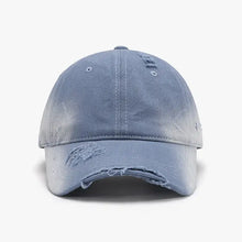 Light blue distressed adjustable cotton hat with worn-in look