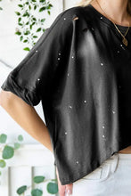 Distressed asymmetric hem cropped tee shirt with white paint splatters