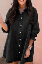 Black denim dress with distressed collared neck and button front featuring ruffled cuffs and flounce sleeves