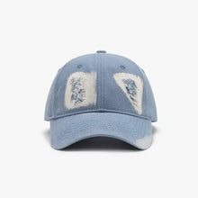 Light blue distressed cotton baseball cap with white patches