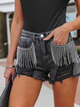 Distressed fringe denim shorts with rhinestone fringe pockets