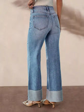 Light-wash denim high-rise flare jeans with rolled cuffs offer a perfect fit for best results and stylish wear