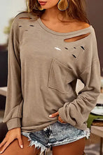 Distressed pocketed round neck long sleeve T-shirt with frayed denim shorts