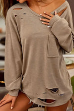 Distressed pocketed round neck long sleeve t-shirt for women