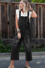 Women’s distressed wide strap denim overalls with cropped wide legs