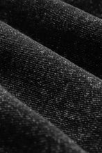 Distressed wide strap denim overalls in charcoal gray textured fabric with speckles