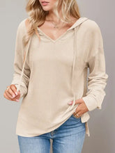 Light beige waffle knit hooded top with drawstring dropped shoulder