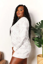 White satin double take floral long sleeve top and shorts loungewear set with subtle floral pattern and short sleeve length