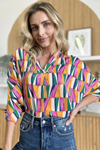 A vibrant double take full size geometric notched dolman sleeve top in pink orange green and white perfect for jeans size