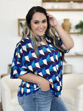 Double take full size geometric notched half sleeve blouse in blue and white geometric pattern with short sleeves
