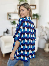 Blue and white geometric patterned relaxed fit blouse with notched half sleeves in Double Take full size style