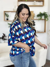 Double take full size geometric notched half sleeve blouse in vibrant blue white and purple with three quarter sleeves