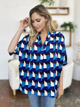 Blue and white geometric-patterned short-sleeve blouse with v-neckline from double take full size collection