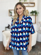 Blue and white geometric patterned short-sleeve blouse with v-neckline from double take full size collection