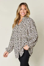 Double take full size leopard long sleeve blouse is a loose-fitting womens top with black and beige leopard print