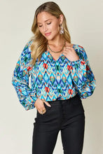 Double take full size printed balloon sleeve blouse in vibrant blue green and red geometric pattern with puffy sleeves