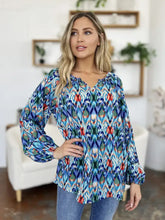 Double take full size printed balloon sleeve blouse in vibrant blue red and green ikat pattern with v neckline