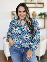 Double take full size printed balloon sleeve blouse with bold geometric ikat pattern in blue teal red and white