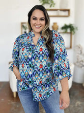 Double take full size printed balloon sleeve blouse in vibrant blue green and red ikat pattern with v-neck and three-quarter sleeves