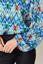 Vibrant blue green and red ikat patterned double take full size printed balloon sleeve blouse with long sleeves