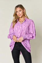 Lavender zebra-print blouse with puffed sleeves and elasticated cuffs ideal for plus size jeans size styling