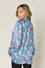 Double Take full size printed smocked long sleeve blouse with flowing teal and purple abstract floral pattern and high neckline