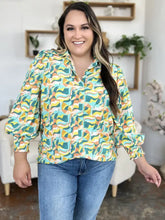 Double take full size printed smocked long sleeve blouse in teal yellow and orange with abstract wave pattern
