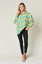 Double Take full size printed smocked long sleeve blouse in vibrant green yellow and teal abstract pattern with puffed sleeves