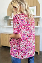 Double take full size printed v-neck short sleeve blouse with vibrant pink and red floral print fabric