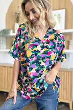 Double take full size printed v-neck short sleeve top with colorful abstract floral pattern perfect for jeans size variety