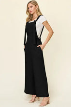 Black textured wide-leg Double Take jumpsuit, machine wash cold