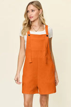 Double Take Texture Sleeveless Romper back: orange fabric overalls, machine wash cold