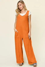 Orange ribbed knit Double Take jumpsuit, professionally dry clean