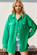 Green full-size textured drop shoulder shacket with quilted button-up design