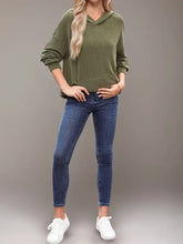 Olive green textured kangaroo pocket long sleeve hoodie with V-neck