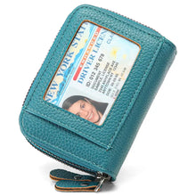 Teal textured leather Double Zipper Card Case with ID window showing New York State license