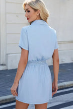 Light blue short sleeve denim dress with drawstring collar and elastic waistband for casual wear