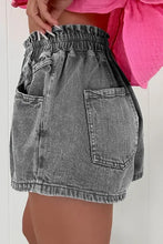 Washed black drawstring denim shorts with elastic high waist and pockets