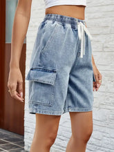 Light wash drawstring denim shorts with waist stretch and pockets