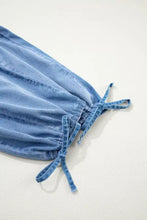Light blue denim drawstring elastic waist loose fit jeans with pockets for casual wear