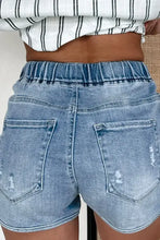 Light blue high waist distressed denim shorts with drawstring