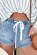 Drawstring high waist distressed denim shorts with white drawstring