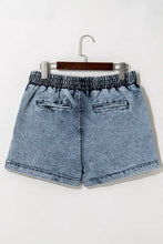 High waist pocketed drawstring denim shorts in light blue wash