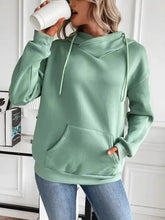 Mint green drawstring long sleeve hoodie with kangaroo pocket