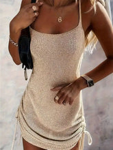 Beige knitted spaghetti strap sweater dress with ruched sides and drawstring hem